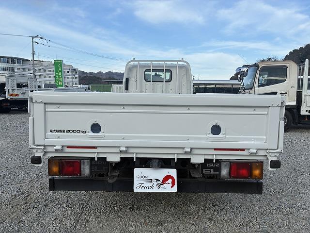 エルフトラック 2t積・標準ロング・平・5MT・5t未満 2t積・標準ロング・平・5MT・5t未満・坂道発進補助装置・ロープ穴4対・メッキパーツ・ETC・シートカバー・キーレス・荷台内寸 L4365 W1798 H382(7枚目)