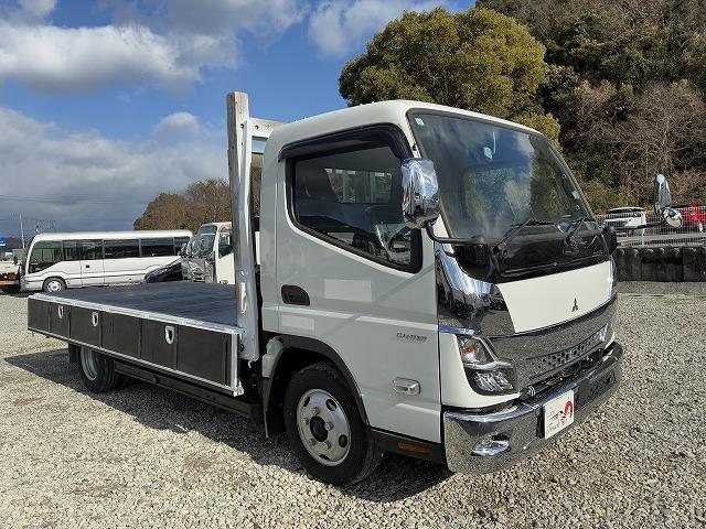 キャンター ワイドロング・平ボディ・２ｔ積・ＡＴ車　ワイドロング・平ボディ・２ｔ積・ＡＴ車・坂道発進補助装置・電格ミラー・エコスイッチ・メッキパーツ・アシストゲート・ゲートプロテクター・ロープホール３対・荷台内寸　Ｌ４２４８　Ｗ１９１１　Ｈ３９６（9枚目）