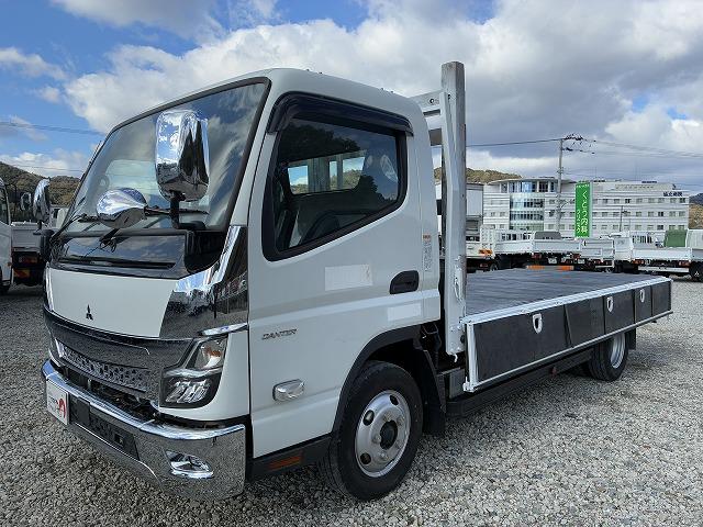 キャンター ワイドロング・平ボディ・２ｔ積・ＡＴ車　ワイドロング・平ボディ・２ｔ積・ＡＴ車・坂道発進補助装置・電格ミラー・エコスイッチ・メッキパーツ・アシストゲート・ゲートプロテクター・ロープホール３対・荷台内寸　Ｌ４２４８　Ｗ１９１１　Ｈ３９６（10枚目）