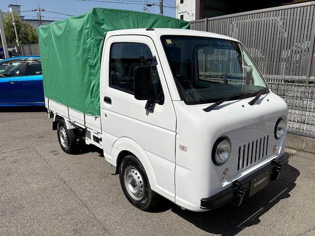 キャリイトラック ＫＣエアコン・パワステ　ウーキーライダーフェイスＫＩＴ　ｃａｒｒｏｚｚｅｒｉａスマホリンク型ディスプレイオーディオ　バックカメラ　ＥＴＣ　ＬＥＤヘッドライト　オートライト　アイドルストップ　横滑り防止　グリーン幌　３方開（15枚目）
