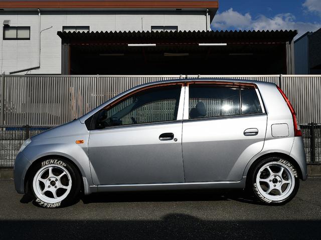 ミラ Ｌ　５ＭＴ　ＷｉｒｕｓＷｉｎレーシングマフラー　フルタップ車高調　社外１５インチアルミ　タイヤ残溝７分山　タワーバー　牽引フック　ディープコーンステアリング　社外シフトノブ　社外タコメーター　ＥＴＣ（6枚目）