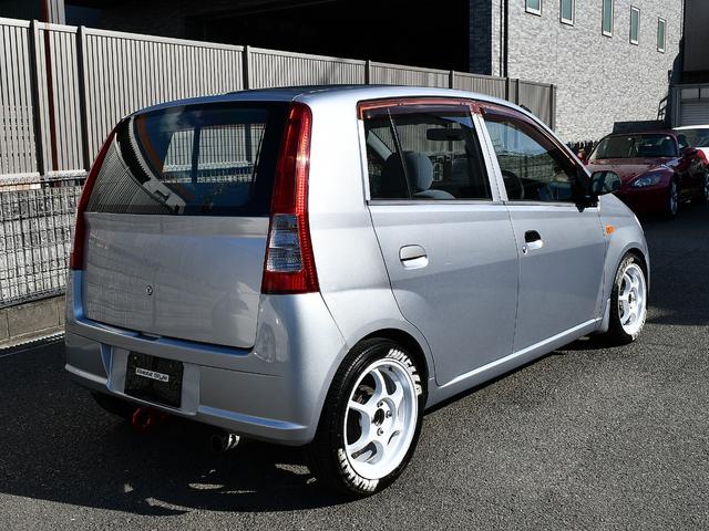 ミラ Ｌ　５ＭＴ　ＷｉｒｕｓＷｉｎレーシングマフラー　フルタップ車高調　社外１５インチアルミ　タイヤ残溝７分山　タワーバー　牽引フック　ディープコーンステアリング　社外シフトノブ　社外タコメーター　ＥＴＣ（11枚目）