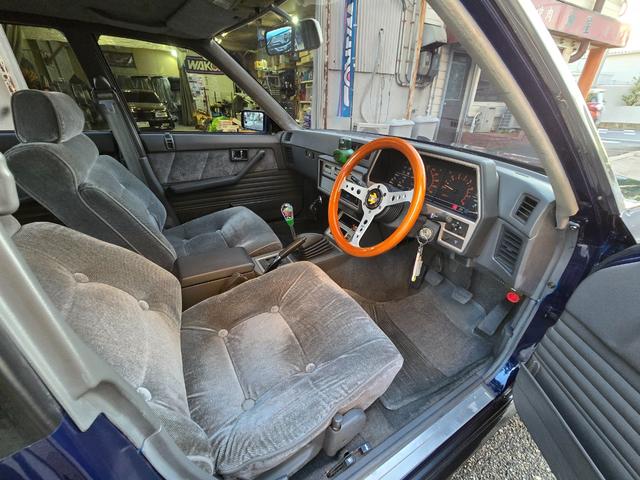 スカイライン ターボGT-E Xエクストラ 走行7万km代/フルエアロ/車高調/エクイップ01/マフラー/TS-X25/当時物momo32Φステアリング/オートワイパー/オーディオデッキ/全塗装/純正部品有/5MT/水中花シフト/L型エンジン(28枚目)