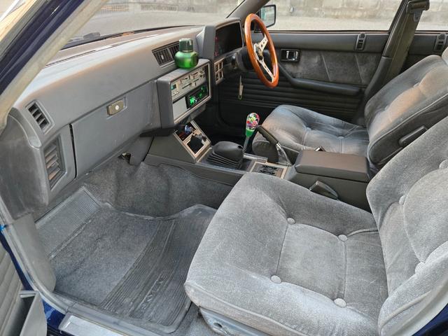 スカイライン ターボGT-E Xエクストラ 走行7万km代/フルエアロ/車高調/エクイップ01/マフラー/TS-X25/当時物momo32Φステアリング/オートワイパー/オーディオデッキ/全塗装/純正部品有/5MT/水中花シフト/L型エンジン(32枚目)