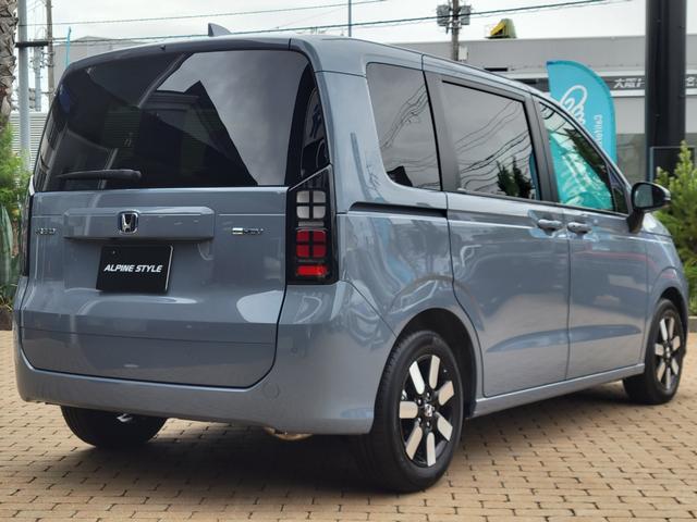 フリード ｅ：ＨＥＶエアー　ＥＸ　アルパインＢＩＧＸ　ＥＴＣ　登録済み未使用車　　禁煙車　ホンダセンシング　両側自動ドア　ＬＥＤヘッドライト　スマートキー　プッシュスタート　アダプティブクルーズコントロール　電子パーキング（12枚目）