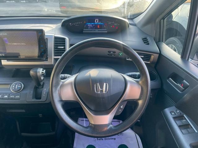 フリードスパイクハイブリッド ハイブリッド　車両品質評価書付・Ｋｅｎｗｏｏｄフローティングナビ・バックカメラ・Ｂｌｕｅｔｏｏｔｈ・ＤＶＤ・ＣＤ・ＥＴＣ・フルセグ・オートエアコン・両側スライドドア・社外アルミホイール・横滑り防止（64枚目）