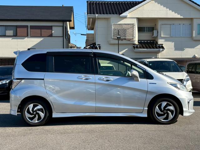 フリードハイブリッド ジャストセレクション 純正ナビ・バックカメラ・・両側電動スライドドアBluetooth・DVD・CD・ビルトインETC・フルセグ・クルーズコントロール・オートエアコン・スマートキー・ステアリングスイッチ・TV(12枚目)