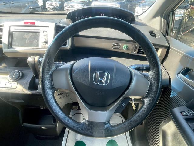 フリードスパイクハイブリッド 　純正ギャザ－ズナビ・ＤＶＤ・ＣＤ・ＵＳＢ・ＡＭ・ＦＭ・ＥＴＣ車載器・ワンセグ・エアコン・両側スライドドア・横滑り防止・ヘッドライトレベライザー・キーレスキー・（65枚目）