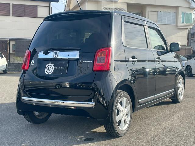 N-ONE プレミアム ナビ・バックカメラ・シートカバー・Bluetooth・DVD・CD・TV・ETC・ディスチャージドランプ・プッシュスタート・オートエアコン・フォグライト・ベンチシート・スマートキー・ステリモ(13枚目)
