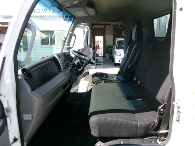 キャンター 　４ｔワイドロング平ボディ　５速マニュアルミッショ　エアコン　パワステ　パワーウィンドウ　エアーバック　ＡＢＳ　キーレス　電格ミラー　リースアップ車（15枚目）