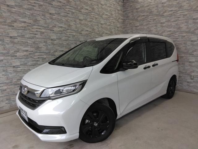 フリード Ｇブラックスタイル　弊社下取車　２年保証　９インチナビＴＶ　リア席モニター　両側パワースライドドア　ＥＴＣ　シートヒーター（5枚目）