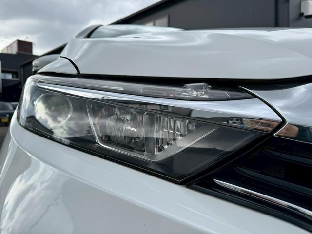 シャトル ハイブリッド　ホンダセンシング　グー鑑定書付／ナビ／バックカメラ／衝突軽減ブレーキ／ＥＴＣ／アダプティブクルーズコントロール／Ｂｌｕｅｔｏｏｔｈ／レーンアシスト／プッシュスタート／スマートキー／スペアスマートキー／オートエアコン（21枚目）