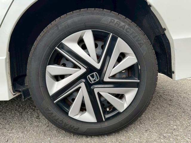 シャトル ハイブリッド　ホンダセンシング　グー鑑定書付／ナビ／バックカメラ／衝突軽減ブレーキ／ＥＴＣ／アダプティブクルーズコントロール／Ｂｌｕｅｔｏｏｔｈ／レーンアシスト／プッシュスタート／スマートキー／スペアスマートキー／オートエアコン（27枚目）