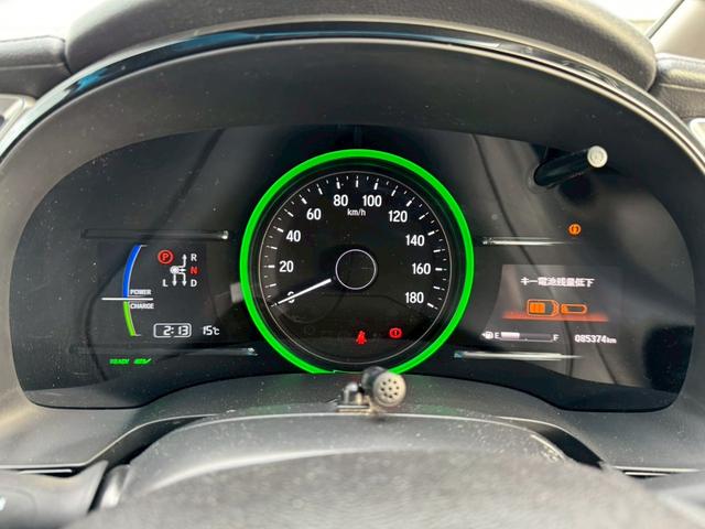 シャトル ハイブリッド　ホンダセンシング　グー鑑定書付／ナビ／バックカメラ／衝突軽減ブレーキ／ＥＴＣ／アダプティブクルーズコントロール／Ｂｌｕｅｔｏｏｔｈ／レーンアシスト／プッシュスタート／スマートキー／スペアスマートキー／オートエアコン（29枚目）