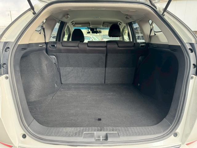 シャトル ハイブリッド　ホンダセンシング　グー鑑定書付／ナビ／バックカメラ／衝突軽減ブレーキ／ＥＴＣ／アダプティブクルーズコントロール／Ｂｌｕｅｔｏｏｔｈ／レーンアシスト／プッシュスタート／スマートキー／スペアスマートキー／オートエアコン（58枚目）