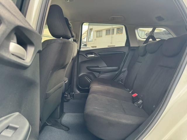 シャトル ハイブリッド　ホンダセンシング　グー鑑定書付／ナビ／バックカメラ／衝突軽減ブレーキ／ＥＴＣ／アダプティブクルーズコントロール／Ｂｌｕｅｔｏｏｔｈ／レーンアシスト／プッシュスタート／スマートキー／スペアスマートキー／オートエアコン（66枚目）