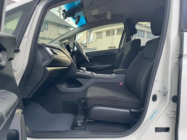 シャトル ハイブリッド　ホンダセンシング　グー鑑定書付／ナビ／バックカメラ／衝突軽減ブレーキ／ＥＴＣ／アダプティブクルーズコントロール／Ｂｌｕｅｔｏｏｔｈ／レーンアシスト／プッシュスタート／スマートキー／スペアスマートキー／オートエアコン（71枚目）