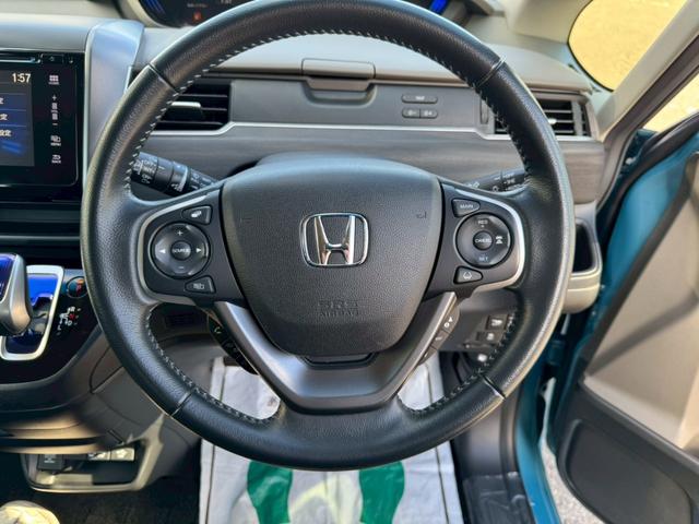 フリードハイブリッド ハイブリッド・Gホンダセンシング グー認定書付/純正ナビ/バックカメラ/衝突軽減ブレーキ/両側電動スライドドア/ETC車載器/レーンアシスト/Bluetooth/フルセグテレビ/スペアスマートキー/プッシュスタート/LEDヘッドライト(27枚目)