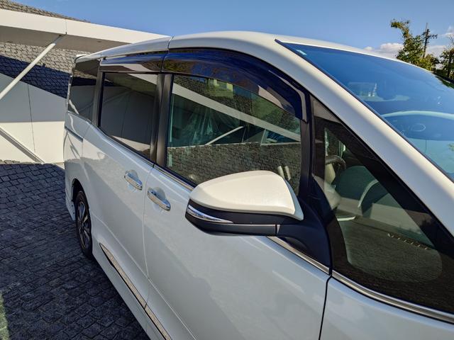 エスクァイア ハイブリッドＧｉ　プレミアムパッケージ　モデリスタエアロ・純正１０インチナビ・フリップダウンモニター・パワーバックドア・ハーフレザーシート・シートヒーター・両側オートスライドドア・プリクラッシュセーフティ・ＬＤＡ・オートクルーズ（6枚目）