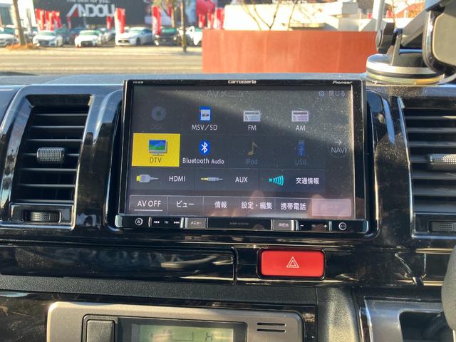 ハイエースバン 　社外８インチナビ＆地デジ・バックモニター・社外エアロ・社外１７ＡＷ・ＬＥＤライト・スマートキー・シートカバー・ＥＴＣ・コンビハンドル・社外テールレンズ・エアバッグ・ＡＢＳ（19枚目）