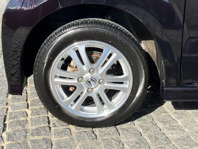 Ｎ－ＢＯＸカスタム Ｇ・Ｌパッケージ　社外ナビ＆地デジ・オートスライドドア・キセノンライト・純正１４ＡＷ・ベンチシート・スマートキー・オートエアコン・ＥＴＣ・フォグ・Ｗエアバッグ・ＡＢＳ（9枚目）