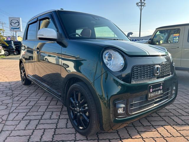 N-ONE プレミアムツアラーSSネオクラシックレーサーパッケジ ギャザス7インチメモリーナビ(フルセグTV・CD・DVD・ラジオ・BT)/前席シートヒーター/ETC/専用装備(ボンネットストライプ・チェッカーデカール/15インチAW・タンカラーコンビシート)(3枚目)