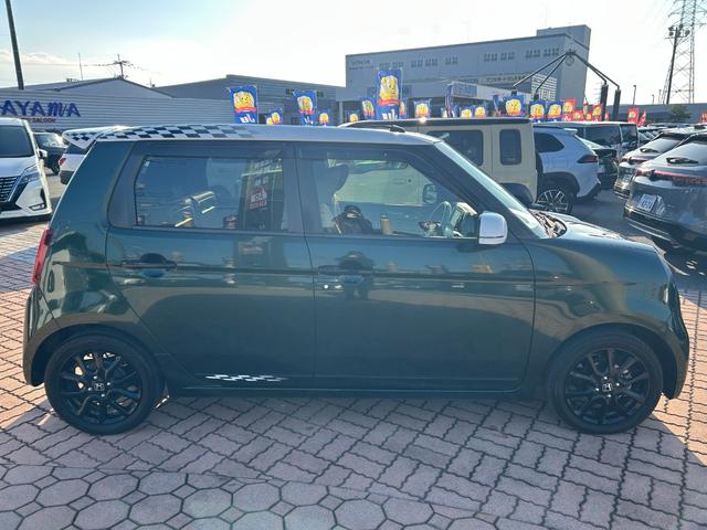 N-ONE プレミアムツアラーSSネオクラシックレーサーパッケジ ギャザス7インチメモリーナビ(フルセグTV・CD・DVD・ラジオ・BT)/前席シートヒーター/ETC/専用装備(ボンネットストライプ・チェッカーデカール/15インチAW・タンカラーコンビシート)(4枚目)