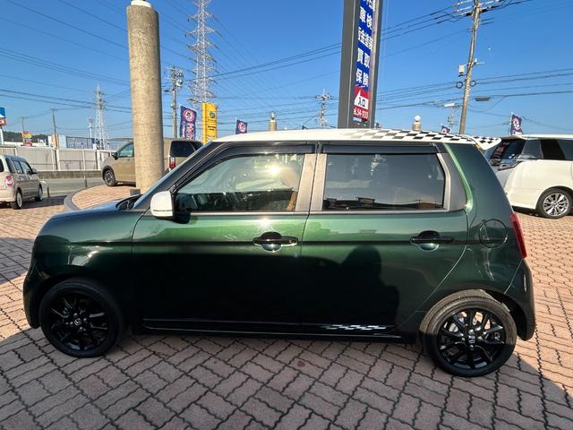 N-ONE プレミアムツアラーSSネオクラシックレーサーパッケジ ギャザス7インチメモリーナビ(フルセグTV・CD・DVD・ラジオ・BT)/前席シートヒーター/ETC/専用装備(ボンネットストライプ・チェッカーデカール/15インチAW・タンカラーコンビシート)(8枚目)