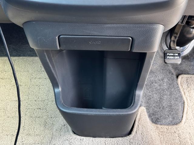 モコ Ｘ　純正ナビ（フルセグ・ラジオ・ＣＤ）／オートエアコン／プッシュスタート／アイドリングストップ／シートリフター／アームレスト／純正アルミホイール／ベンチシート／スマートキー（２個）／パワーウィンドウ（運）（24枚目）