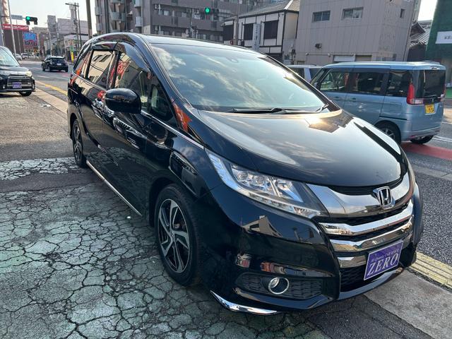 オデッセイ アブソルート・Ｘホンダセンシングアドバンスドパッケジ　センシング／ナビ／ＴＶ／Ｂカメラ／後席Ｍ／ＢＴ／パーキングアシスト／誤発進抑制機能／衝突被害軽減／車線逸脱防止／アダクティブクルコン／ハーフレザーＰシート／オットマン／両自動ドア／２年保証（24枚目）