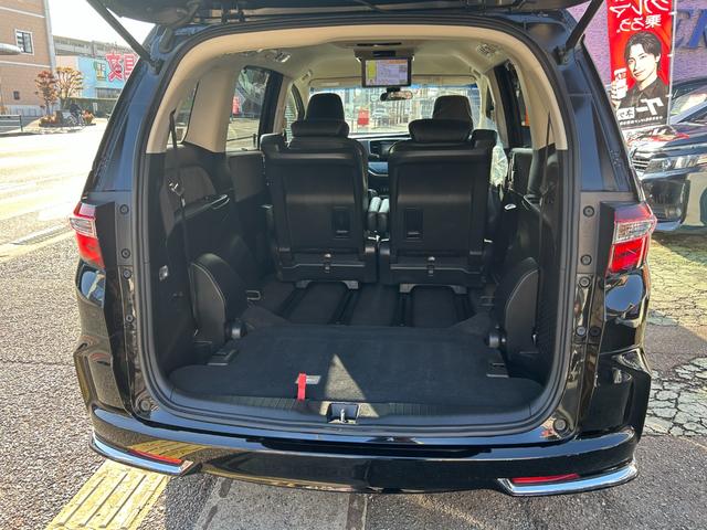 オデッセイ アブソルート・Ｘホンダセンシングアドバンスドパッケジ　センシング／ナビ／ＴＶ／Ｂカメラ／後席Ｍ／ＢＴ／パーキングアシスト／誤発進抑制機能／衝突被害軽減／車線逸脱防止／アダクティブクルコン／ハーフレザーＰシート／オットマン／両自動ドア／２年保証（34枚目）