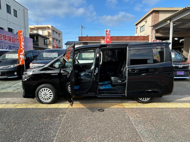 ヴォクシー ハイブリッドＶ　セフティセンス／衝突被害軽減／車線逸脱防止／１０型ナビ／ＴＶ／Ｂカメラ／後席モニター／Ｂｌｕｅｔｏｏｔｈ／シートヒーター／ＬＥＤライト／両側自動ドア／リアスポ／２年保証（2枚目）