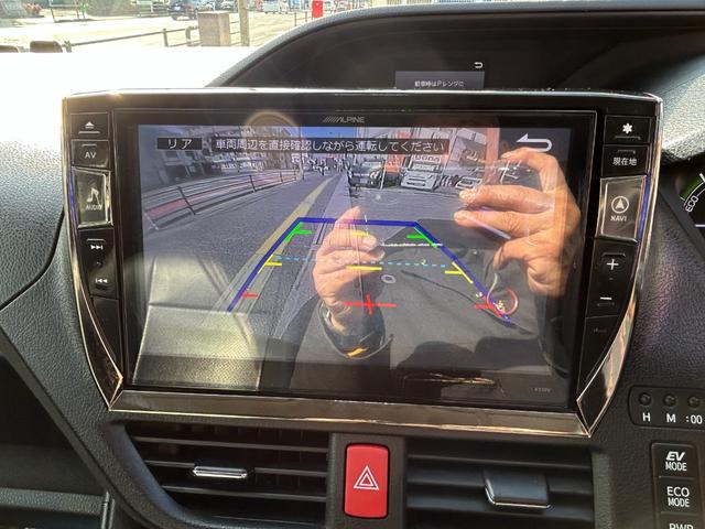ヴォクシー ハイブリッドＶ　セフティセンス／衝突被害軽減／車線逸脱防止／１０型ナビ／ＴＶ／Ｂカメラ／後席モニター／Ｂｌｕｅｔｏｏｔｈ／シートヒーター／ＬＥＤライト／両側自動ドア／リアスポ／２年保証（14枚目）