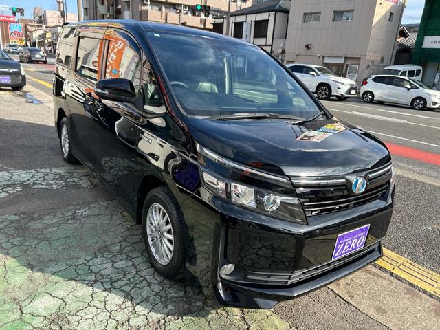 ヴォクシー ハイブリッドＶ　セフティセンス／衝突被害軽減／車線逸脱防止／１０型ナビ／ＴＶ／Ｂカメラ／後席モニター／Ｂｌｕｅｔｏｏｔｈ／シートヒーター／ＬＥＤライト／両側自動ドア／リアスポ／２年保証（23枚目）