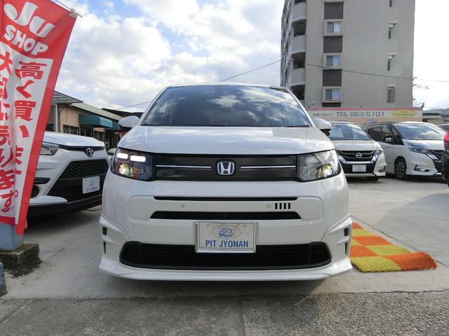 フリード ｅ：ＨＥＶエアーＥＸ　無限アロ　無限１６インチアルミ　無限フルエアロ　無限１６インチアルミホイール　前後ドライブレコーダー　ＥＴＣ　１１．４インチナビフルセグテレビ　全周囲カメラ　ＬＥＤヘッドライト　クリアランスソナー　　両側オートスライドドア　保証書（2枚目）