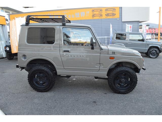 ジムニー ワイルドウインド　リフトアップ　社外マフラー　前後アイアンバンパー　オールペイント　ルーフラック　レザー調シートカバー　ウッドハンドル（4枚目）