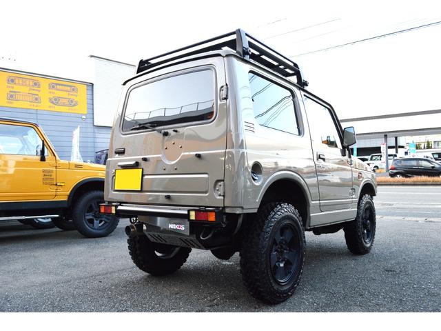 ジムニー ワイルドウインド　リフトアップ　社外マフラー　前後アイアンバンパー　オールペイント　ルーフラック　レザー調シートカバー　ウッドハンドル（5枚目）