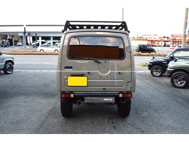 ジムニー ワイルドウインド　リフトアップ　社外マフラー　前後アイアンバンパー　オールペイント　ルーフラック　レザー調シートカバー　ウッドハンドル（6枚目）