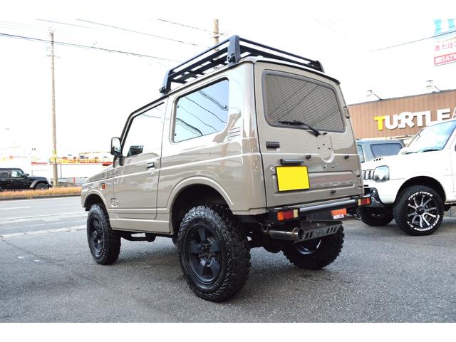 ジムニー ワイルドウインド　リフトアップ　社外マフラー　前後アイアンバンパー　オールペイント　ルーフラック　レザー調シートカバー　ウッドハンドル（7枚目）