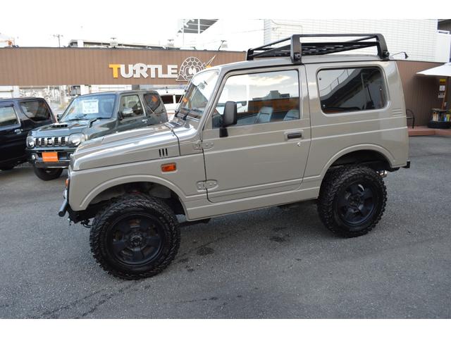 ジムニー ワイルドウインド　リフトアップ　社外マフラー　前後アイアンバンパー　オールペイント　ルーフラック　レザー調シートカバー　ウッドハンドル（8枚目）