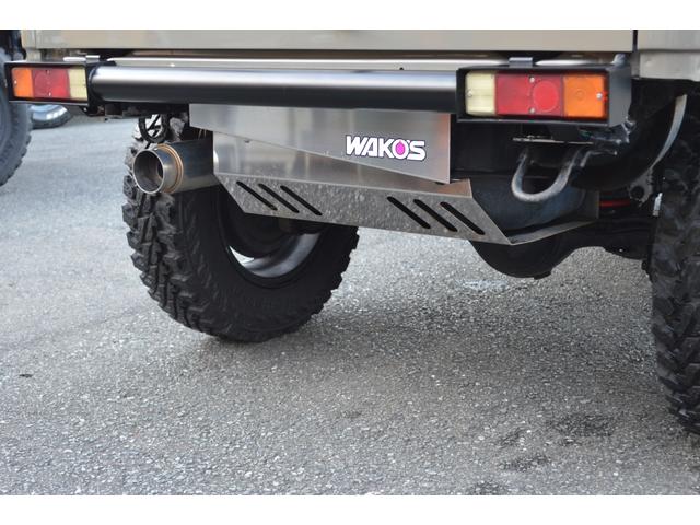 ジムニー ワイルドウインド　リフトアップ　社外マフラー　前後アイアンバンパー　オールペイント　ルーフラック　レザー調シートカバー　ウッドハンドル（15枚目）