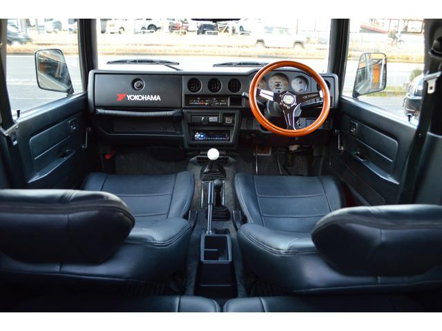 ジムニー ワイルドウインド　リフトアップ　社外マフラー　前後アイアンバンパー　オールペイント　ルーフラック　レザー調シートカバー　ウッドハンドル（16枚目）