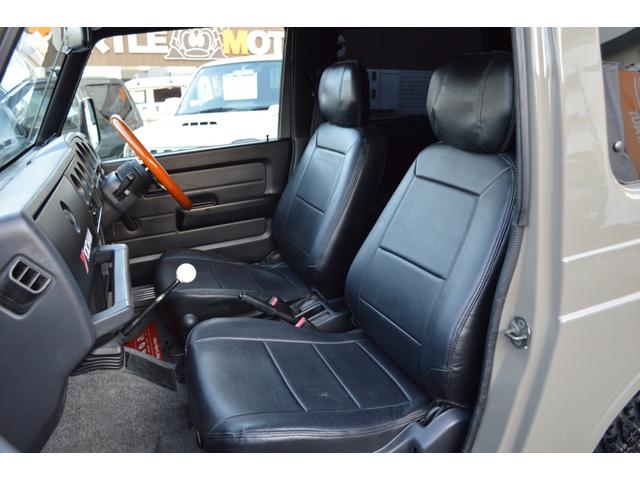 ジムニー ワイルドウインド　リフトアップ　社外マフラー　前後アイアンバンパー　オールペイント　ルーフラック　レザー調シートカバー　ウッドハンドル（21枚目）