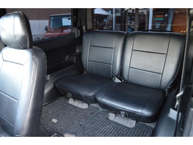 ジムニー ワイルドウインド　リフトアップ　社外マフラー　前後アイアンバンパー　オールペイント　ルーフラック　レザー調シートカバー　ウッドハンドル（22枚目）