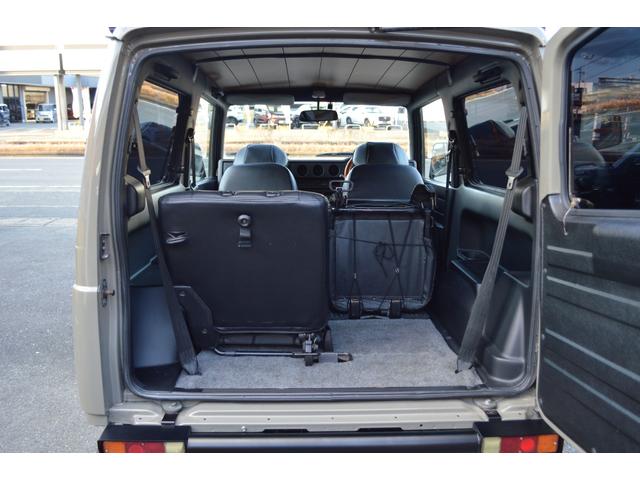 ジムニー ワイルドウインド　リフトアップ　社外マフラー　前後アイアンバンパー　オールペイント　ルーフラック　レザー調シートカバー　ウッドハンドル（31枚目）