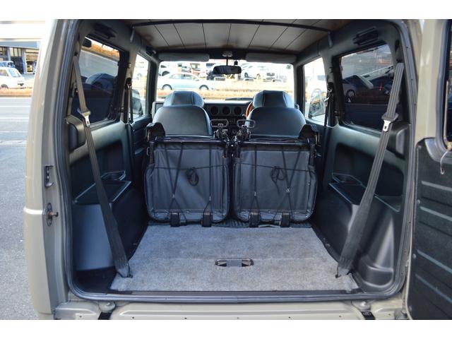 ジムニー ワイルドウインド　リフトアップ　社外マフラー　前後アイアンバンパー　オールペイント　ルーフラック　レザー調シートカバー　ウッドハンドル（32枚目）