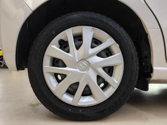 N-BOX G・Lホンダセンシング ワンオーナー 禁煙車 走行3万K台 電動スライドドア ナビ Bカメラ フルセグTV ホンダセンシング クルコン 純正ドラレコ前後 取説整備手帳 スペアキー ETC 盗難防止システム シートヒーター(19枚目)