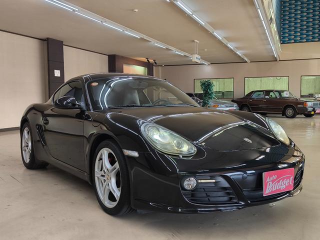 ケイマン Ｓ　ワンオーナー　禁煙車　左ハンドル　走行２万Ｋ台　６速マニュアル車　ハーフレザー　シートヒーター　ナビ　フルセグＴＶ　取説整備手帳　スペアキー　盗難防止システム　　純正１８ＡＷ　ＥＴＣ　横滑り防止機能（3枚目）