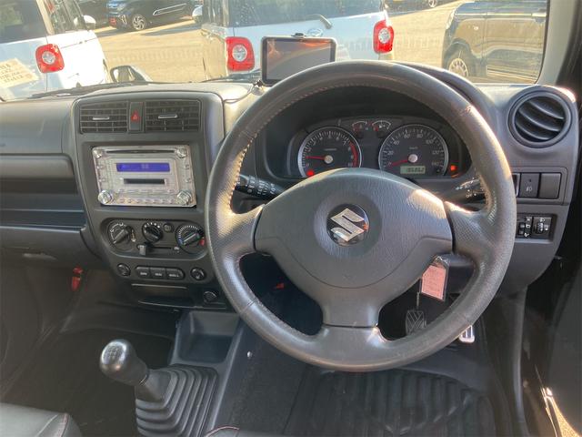 ジムニー ワイルドウインド 4WD ETC キーレスエントリー 電動格納ミラー シートヒーター MT ABS CD MD リフトアップ ルーフレール アルミホイール 衝突安全ボディ エアコン パワーウィンドウ(2枚目)