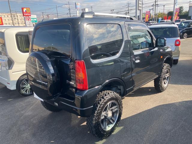 ジムニー ワイルドウインド 4WD ETC キーレスエントリー 電動格納ミラー シートヒーター MT ABS CD MD リフトアップ ルーフレール アルミホイール 衝突安全ボディ エアコン パワーウィンドウ(22枚目)